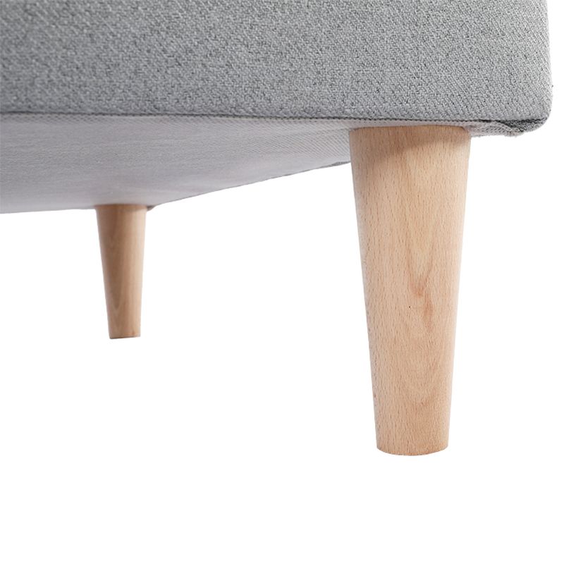 Taburet čalúnený sivou látkou